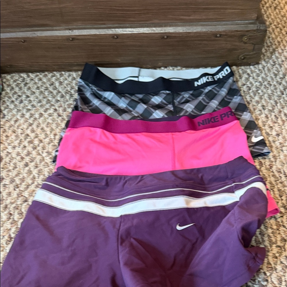 Nike Pro Shorts Trio in Black, Pink, and Purple